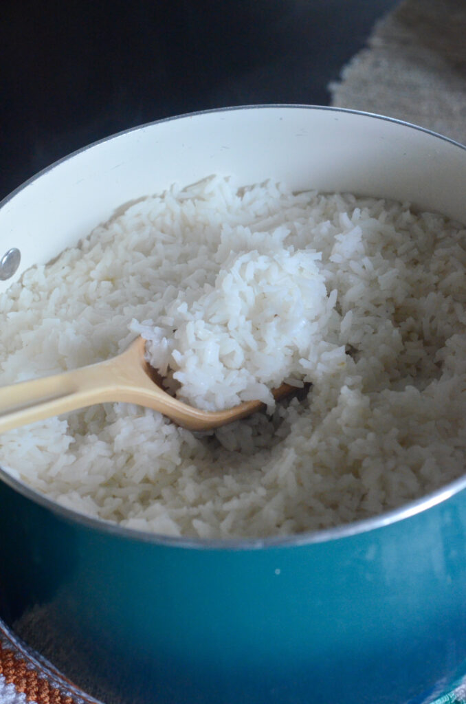 rice in pot with serving spoon