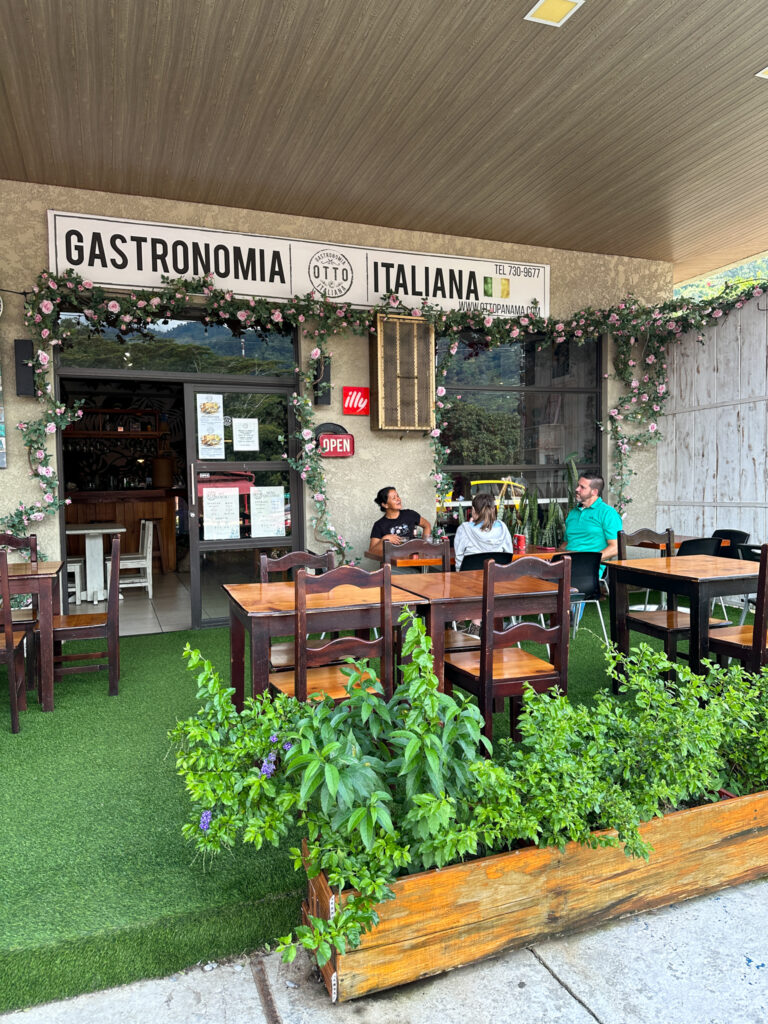 family at patio table at Otto Gastronomia Italiana Restaurant in Boquete, Panama