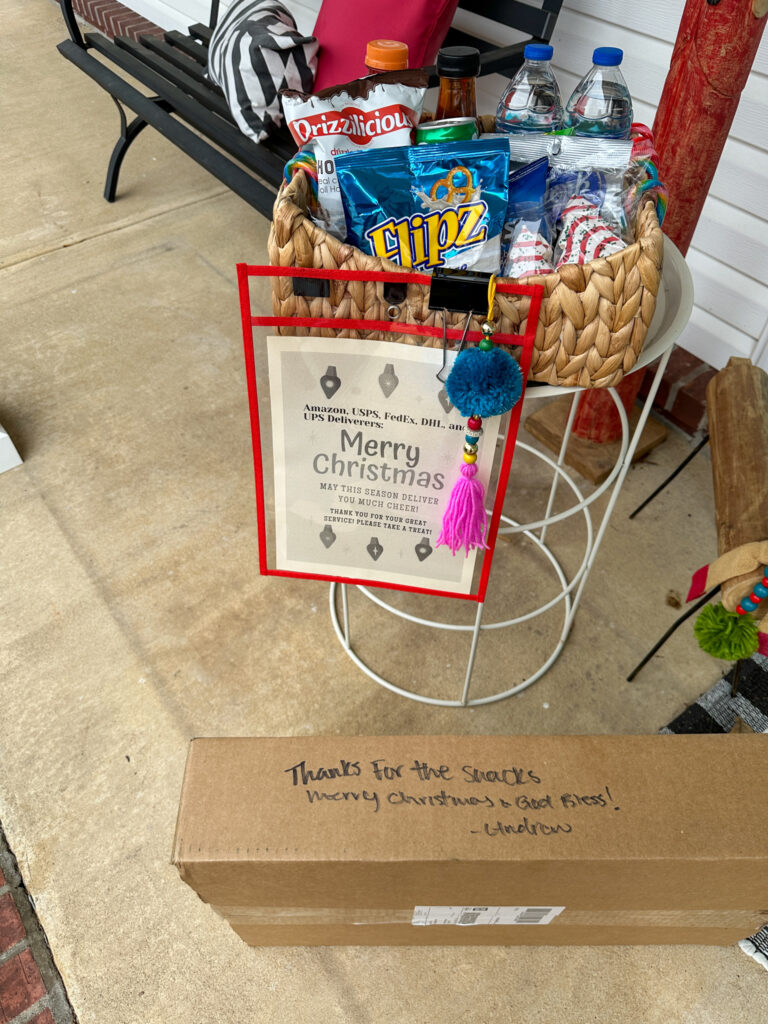 box with message from delivery driver for Christmas snacks for delivery drivers on porch