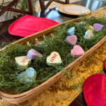 Conversation heart bath bombs in basket for Valentine's Day