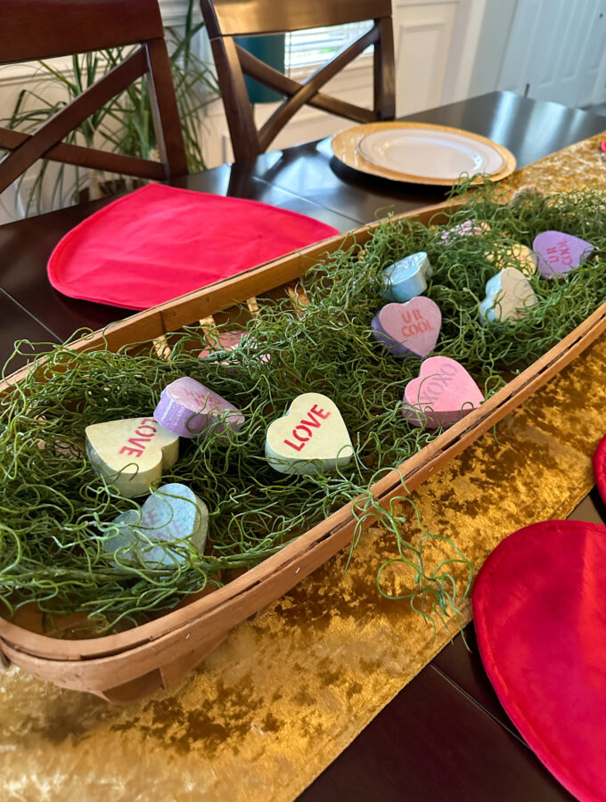 Conversation heart bath bombs in basket for Valentine's Day