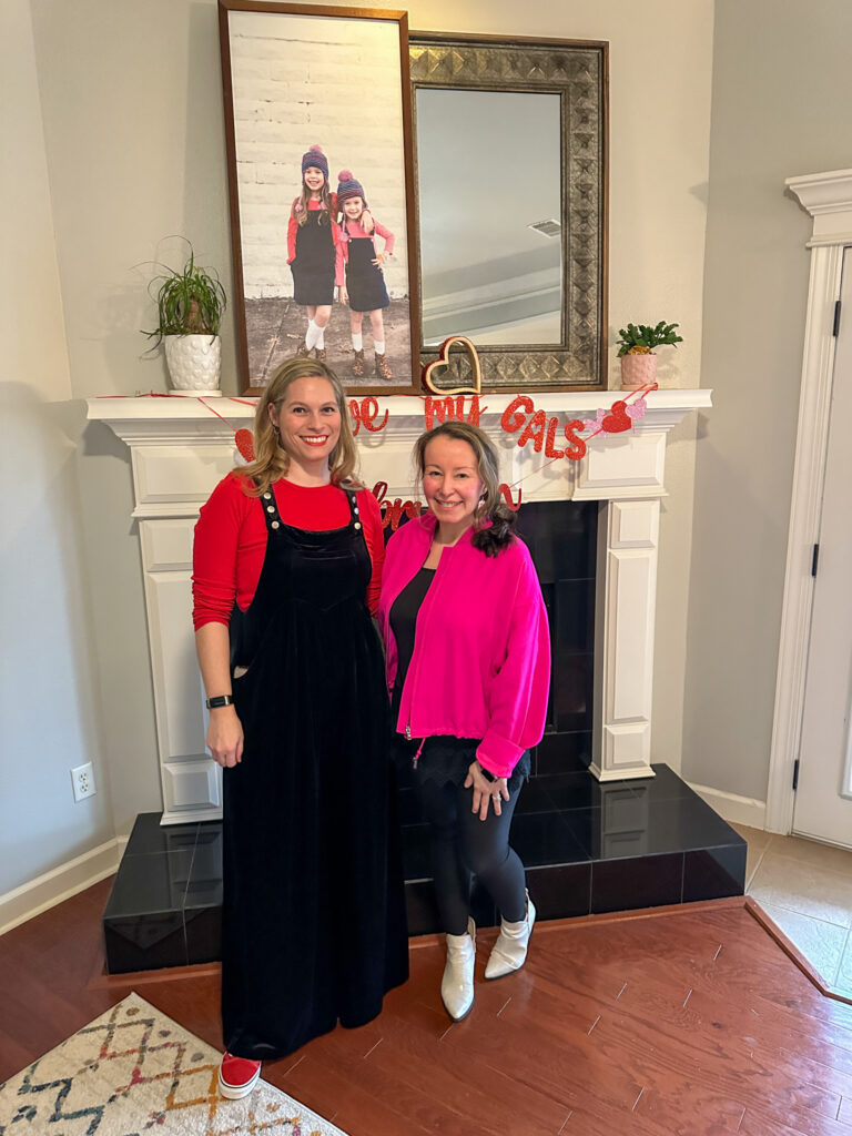 two moms pose at mom and me Galentine's Day brunch