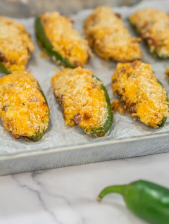 air fryer cream cheese jalapeño poppers on silver platter