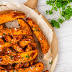 air fryer sweet potato wedges on cutting board