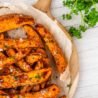 air fryer sweet potato wedges on cutting board