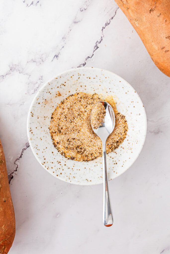 spices in a bowl with a spoon