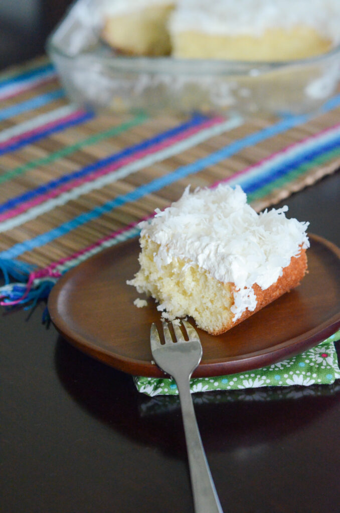 cream of coconut side piece on brown wooden plate