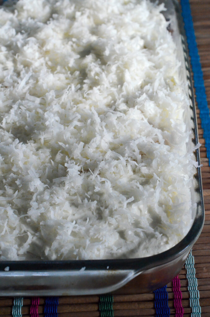 cream of coconut cake on bamboo table runner