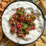 overhead shot of cranberry jalapeño dip on plate of dippers