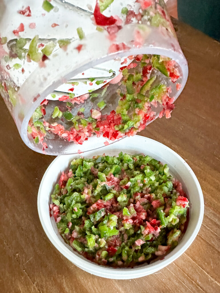 mixture of vegetables in food chopper bowl