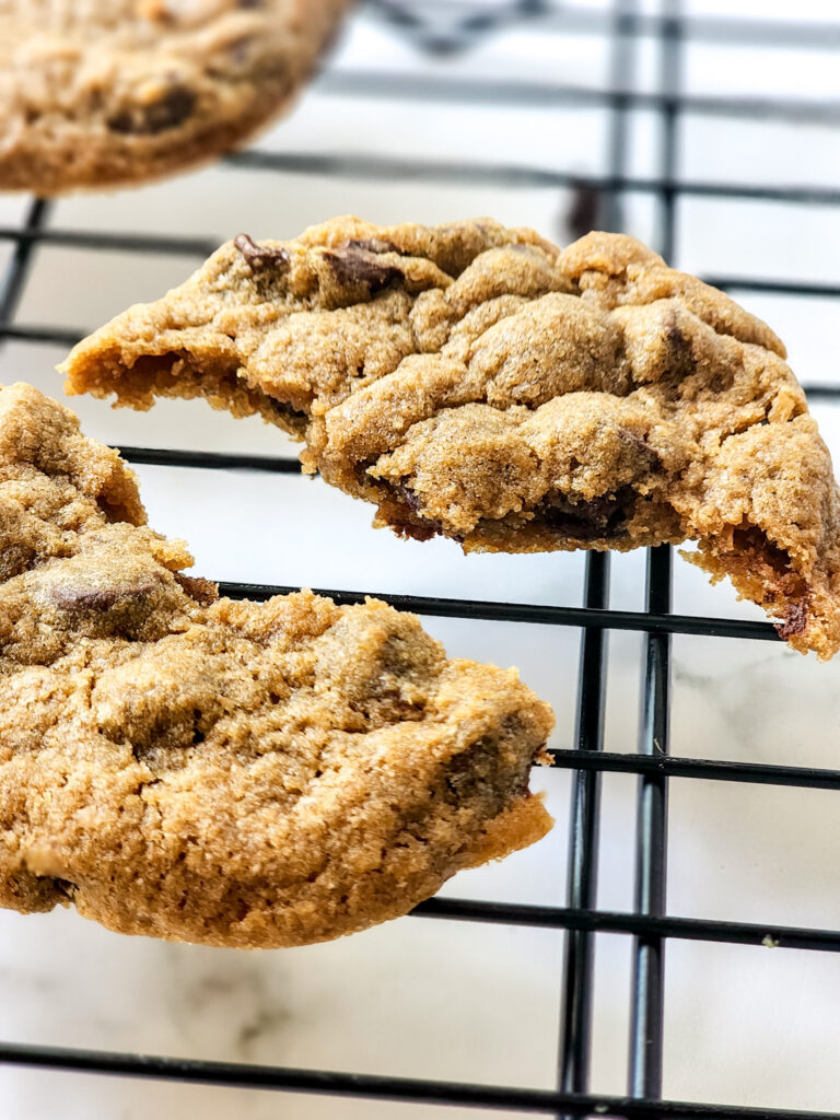 Mrs. Fields chocolate chip cookies copycat cookie broken in half on wire tray