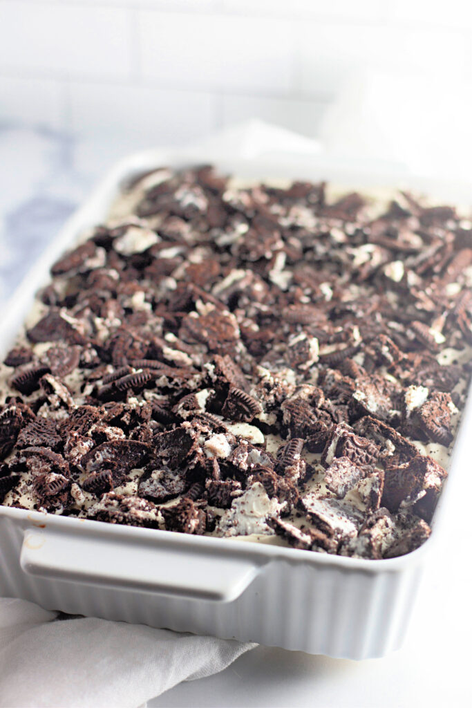 white cake pan with Oreo topping