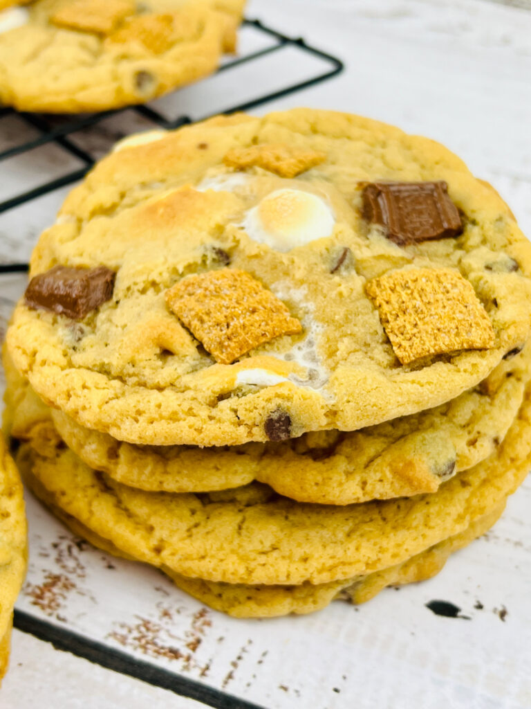 stack of ultimate s'mores cookies on white backdrop