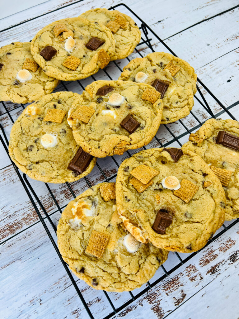ultimate s'mores cookies with marshmallows on baking rack