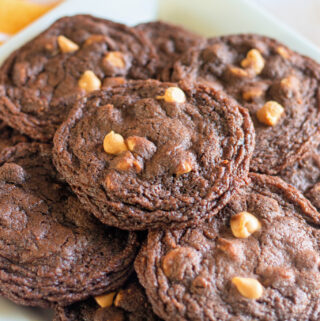 chocolate peanut butter cookies on white platter