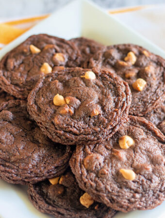 chocolate peanut butter cookies on white platter