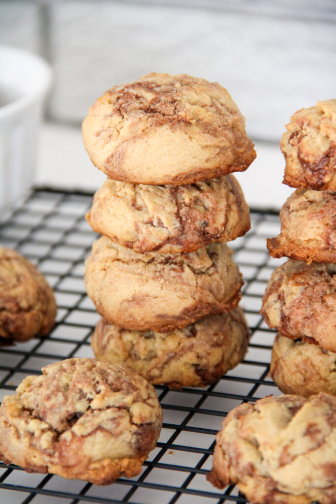 stack of peanut butter Nutella cookies on wire rack
