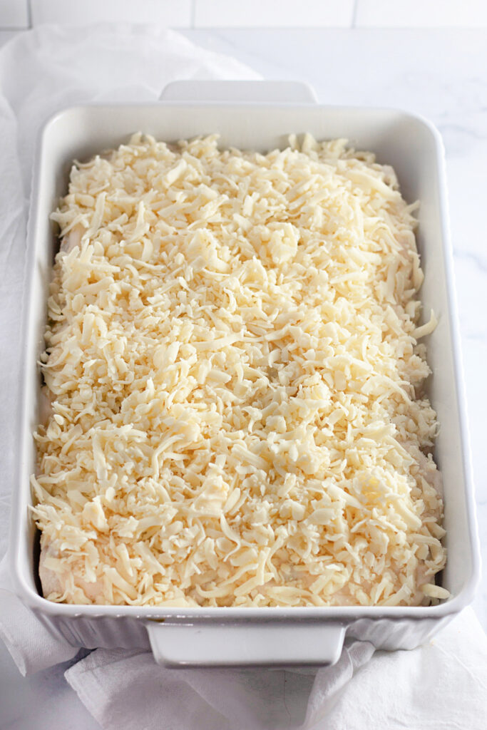baking dish with casserole topped with cheese