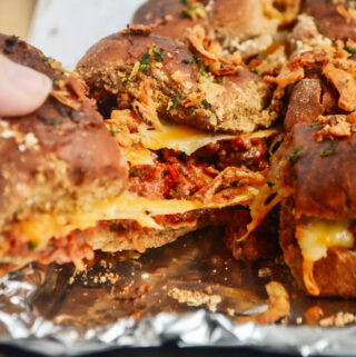 sloppy Joe sliders being pulled from tray