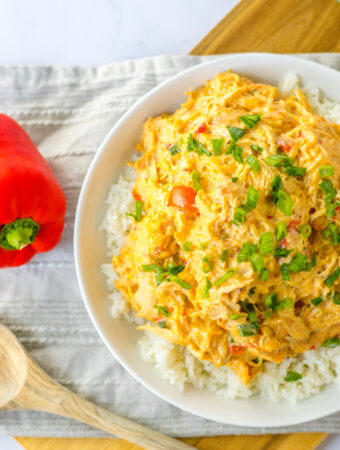slow cooker sweet chili chicken in top down view with white napkin