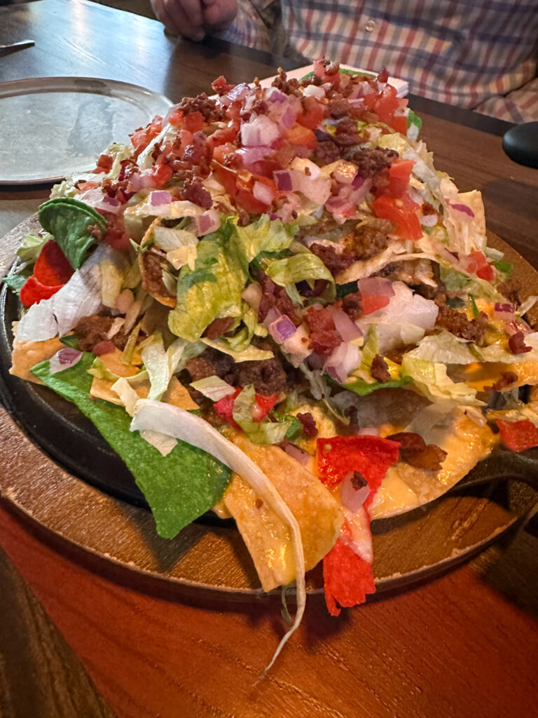 cheeseburger nachos on platter at Nacho Daddy