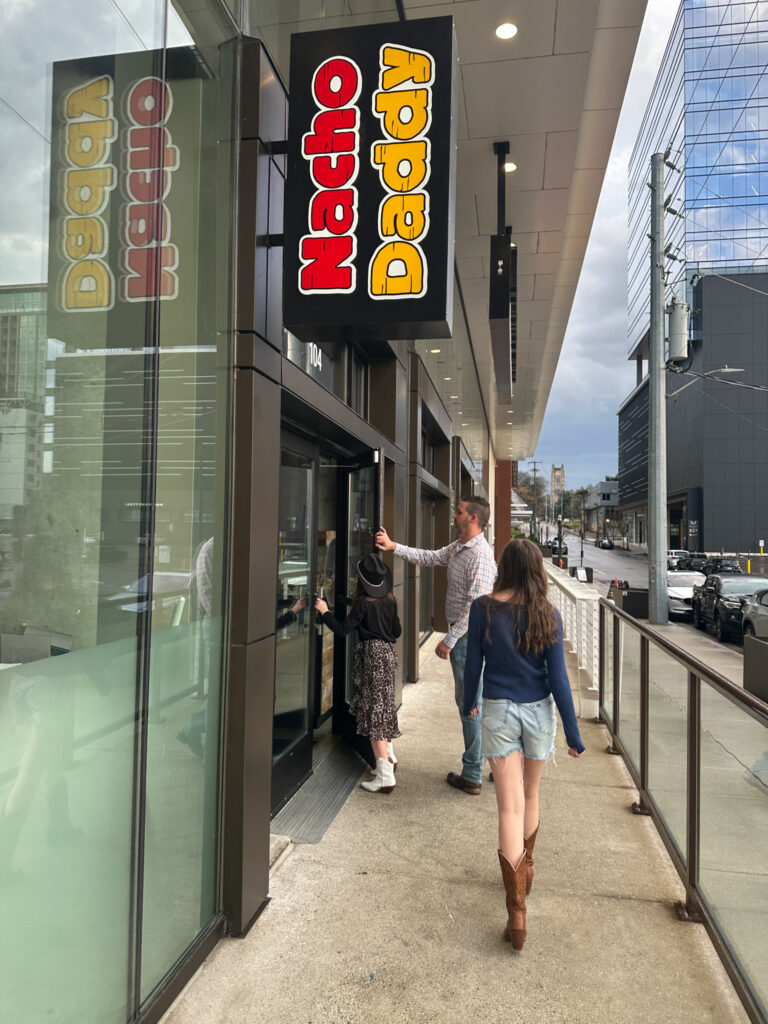 family walking into Nacho Daddy in downtown Nashville