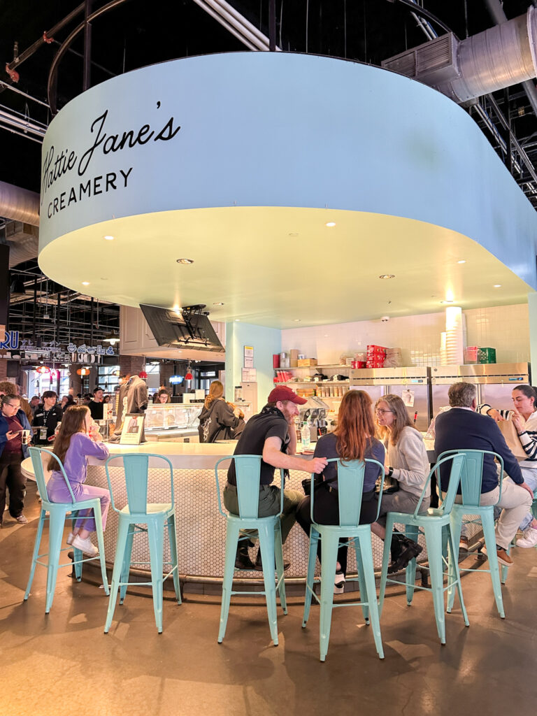 people sitting at Hattie Jane's Creamery counter at Assembly Food Hall in Nashville