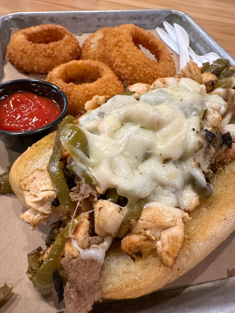 onion rings and chicken Philly from The Philly Special in Assembly Food Hall in Nashville