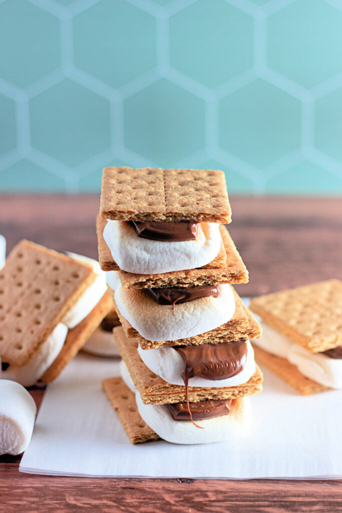 stack of oven s'mores on white parchment paper