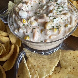 chilled Mexicorn Dip with Rotel on plate with chips