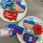 Veteran's Day cookies on plates with gift tags beside