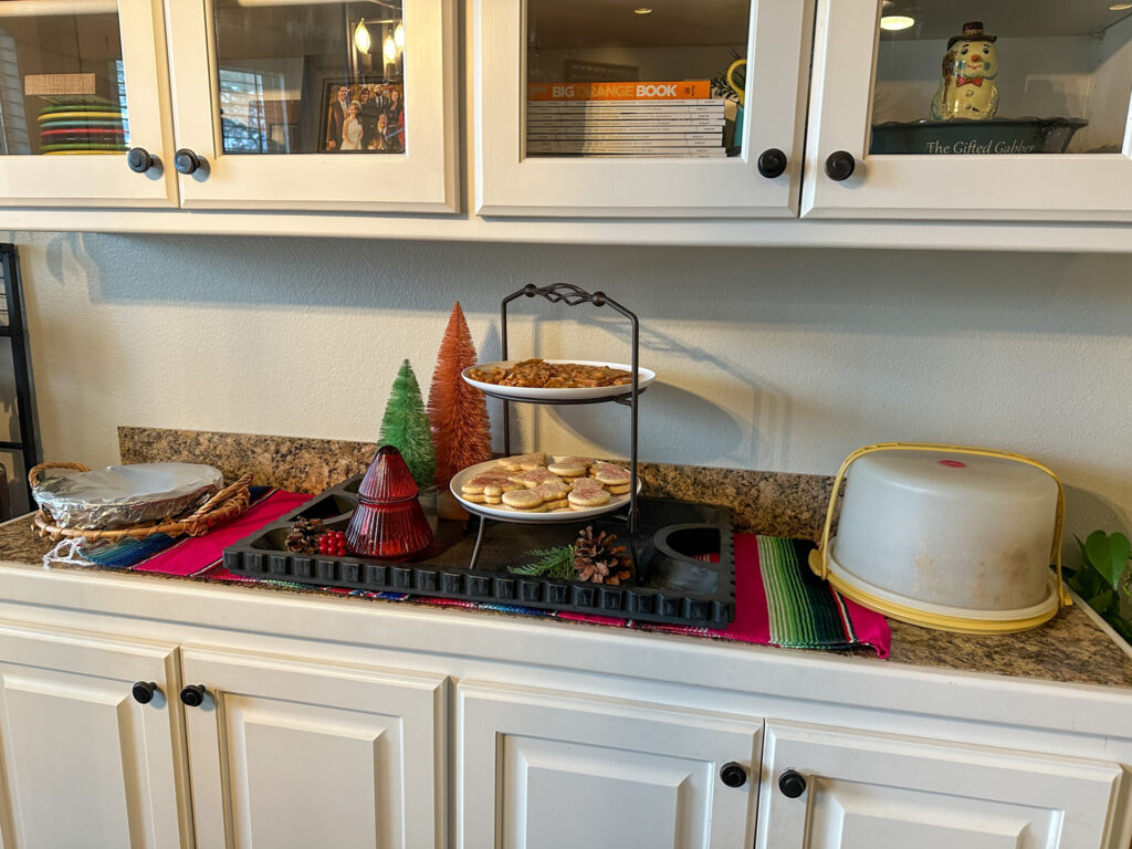 desserts on a holiday dessert bar with a serape underneath