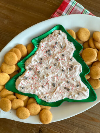 mint chocolate chip dip with cream cheese on Christmas tree tray