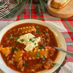 one pot lasagna soup on a plaid table