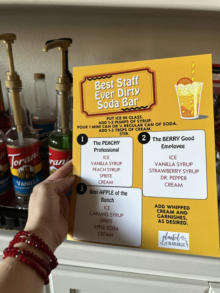 free staff appreciation dirty soda bar menu in woman's hand