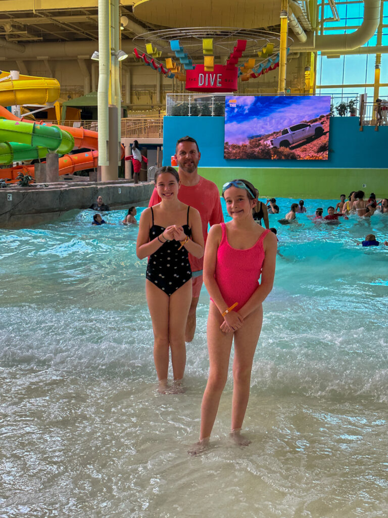 wave pool with Arkansas bloggers, Harper and Norah and their dad in their family travel guide to Okana Resort