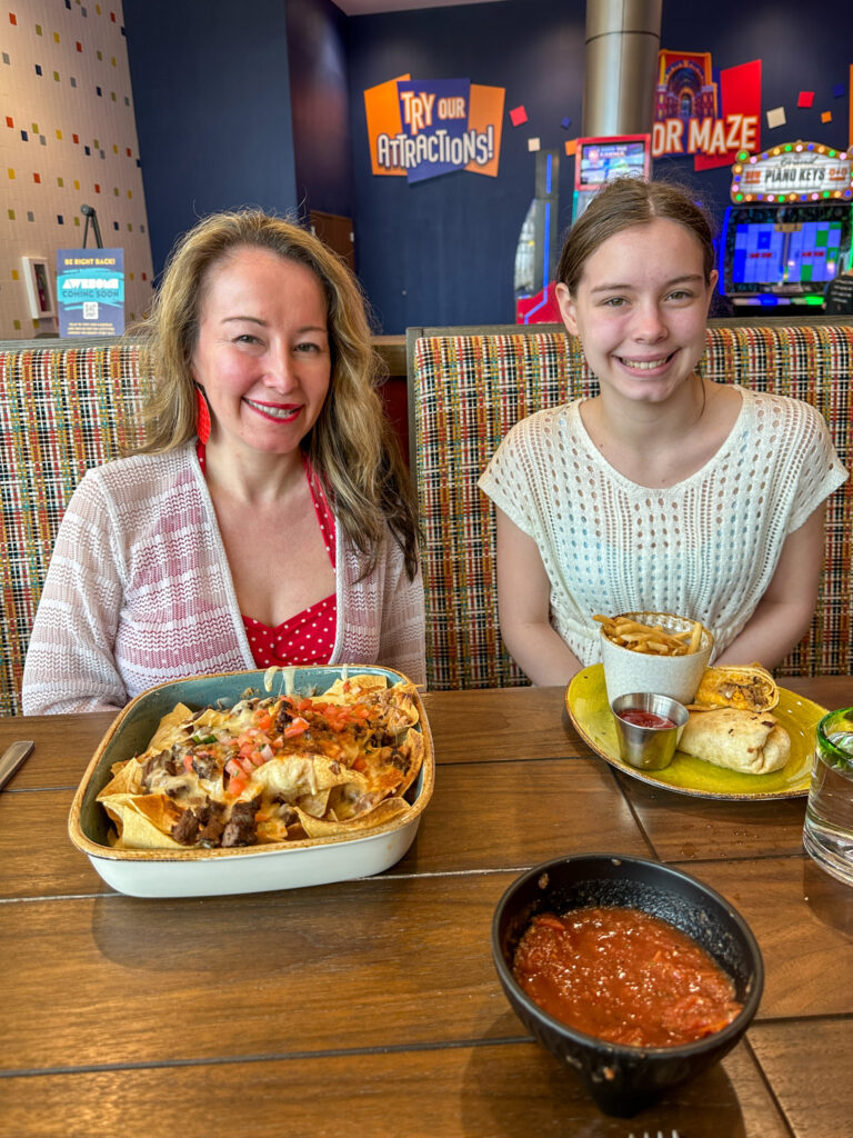 Arkansas bloggers with food at Tacos X Tequila for a family travel guide to Okana in Oklahoma City