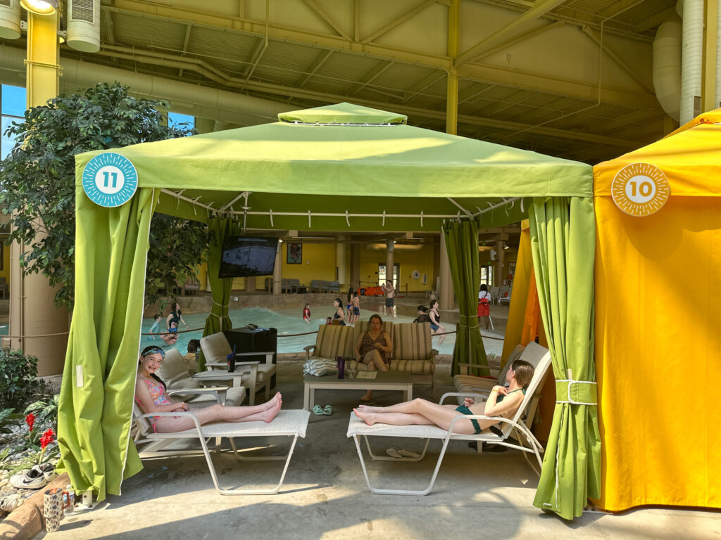 Arkansas bloggers relax inside an indoor cabana at Okana Resort and Waterpark