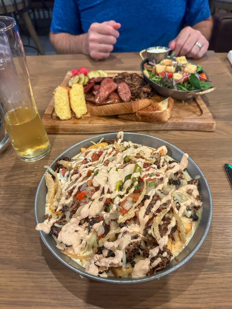 loaded fries and the meat special at Smokehouse Social in OKC for a family travel guide to Okana